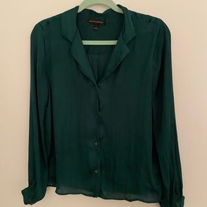 Green silk blouse.